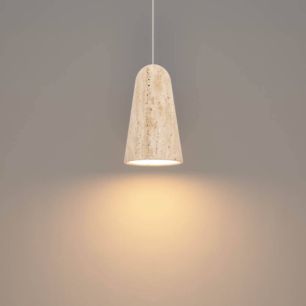 The beige travertine and aged brass Pompeii Pendant Light from Modern Forms in a living room.