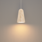 The beige travertine and aged brass Pompeii Pendant Light from Modern Forms in a living room.