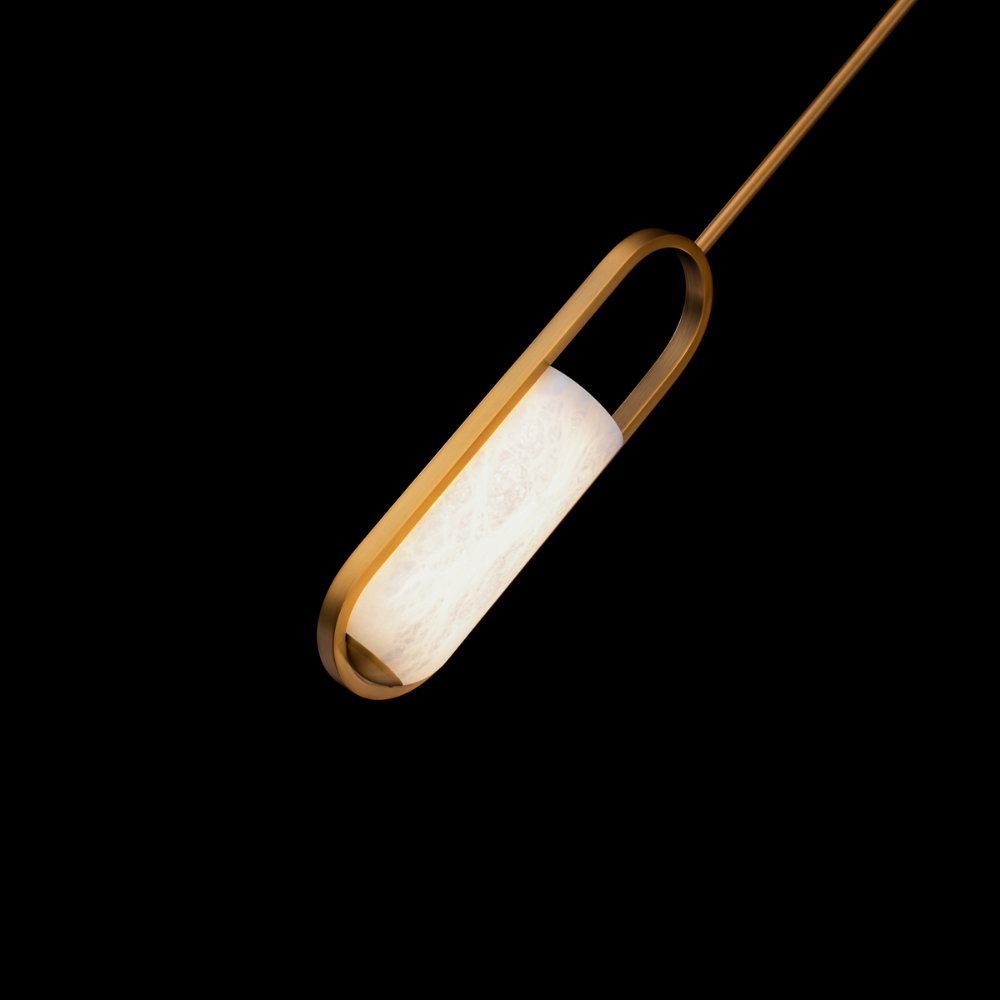 The aged brass Rollins Pendant Light from Modern Forms in a bedroom.