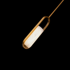 The aged brass Rollins Pendant Light from Modern Forms in a bedroom.