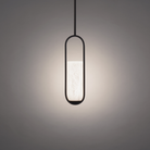 The black Rollins Pendant Light from Modern Forms in a living room.
