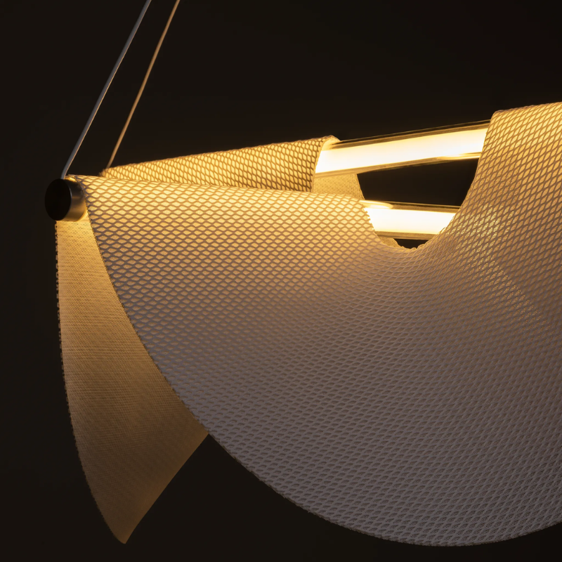 The illuminated shade of the Moooi Drape Light.