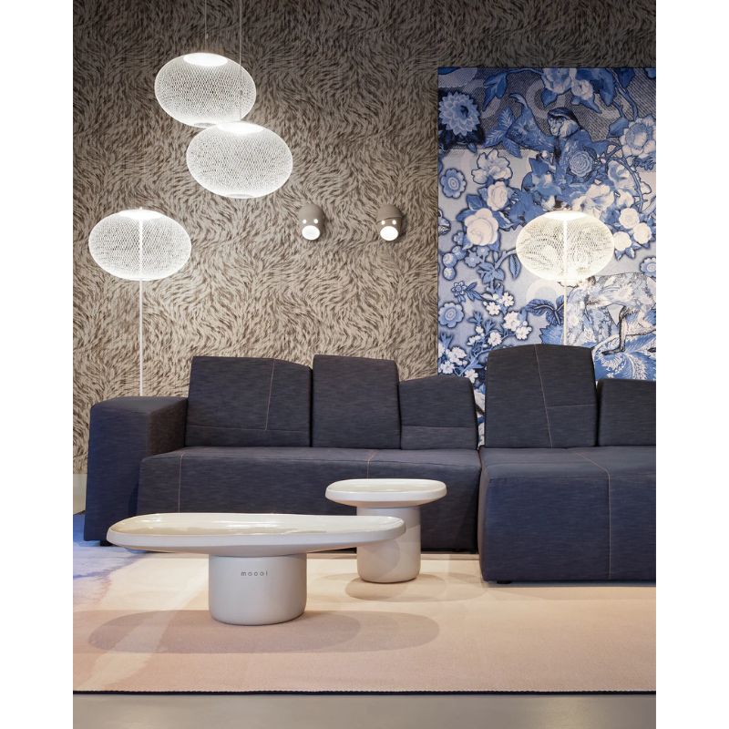 The white NR2 Floor Lamp from Moooi in a living room.