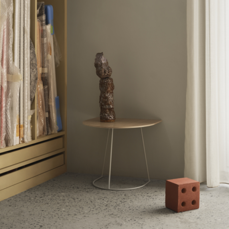 The Airy Coffee Table Half Size Oak from Muuto in a living room.