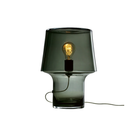 Dark glass table lamp with a visible light bulb.