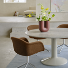 The Kink Vase Deep Red from Muuto in a living room.