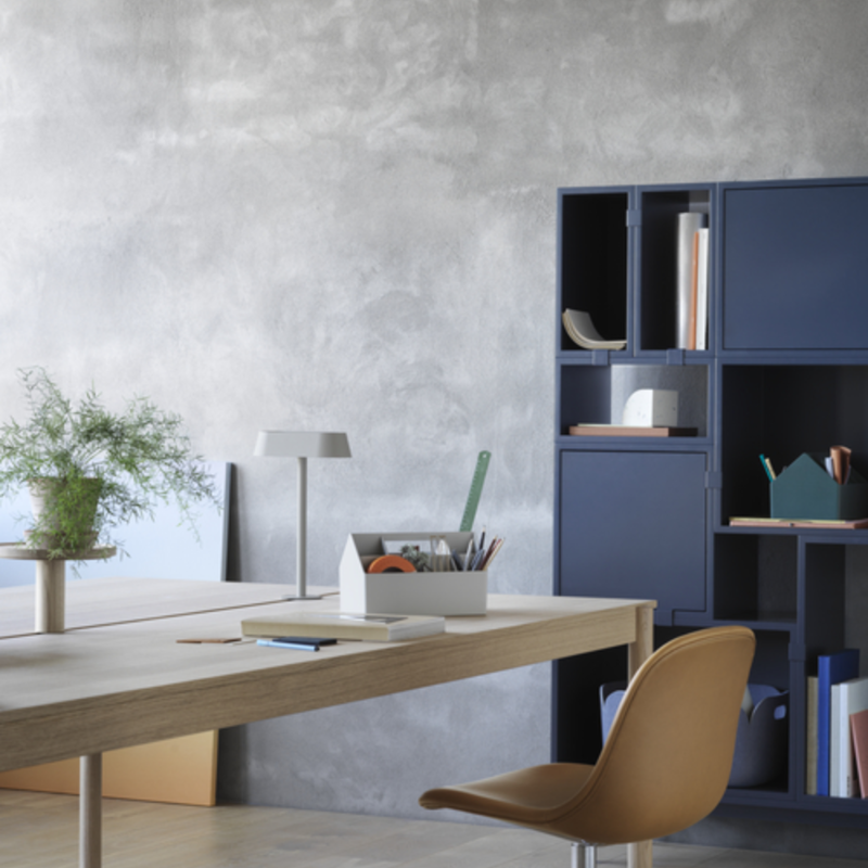 The Linear Mounted Lamp Small Grey from Muuto in an office.