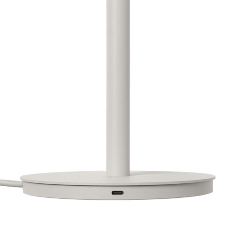 The Linear Table Lamp Gray from Muuto with a close-up of the base.