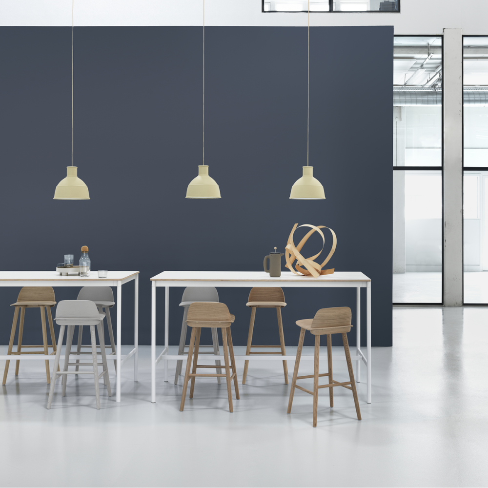 The stained dark brown Nerd Counter Stool from Muuto used as commercial seating. all-groups