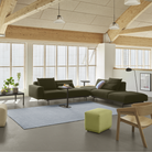 The black Relate Side Table from Muuto in a lounge.