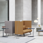 The blue gray Relate Side Table from Muuto in a business space.