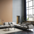 The off-white Relate Side Table from Muuto in a family room.