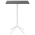 The 41 inch Still Cafe Table from Muuto with the black nanolaminate table top and white frame.
