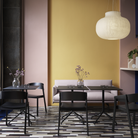 The Still Cafe Table from Muuto in a living area.