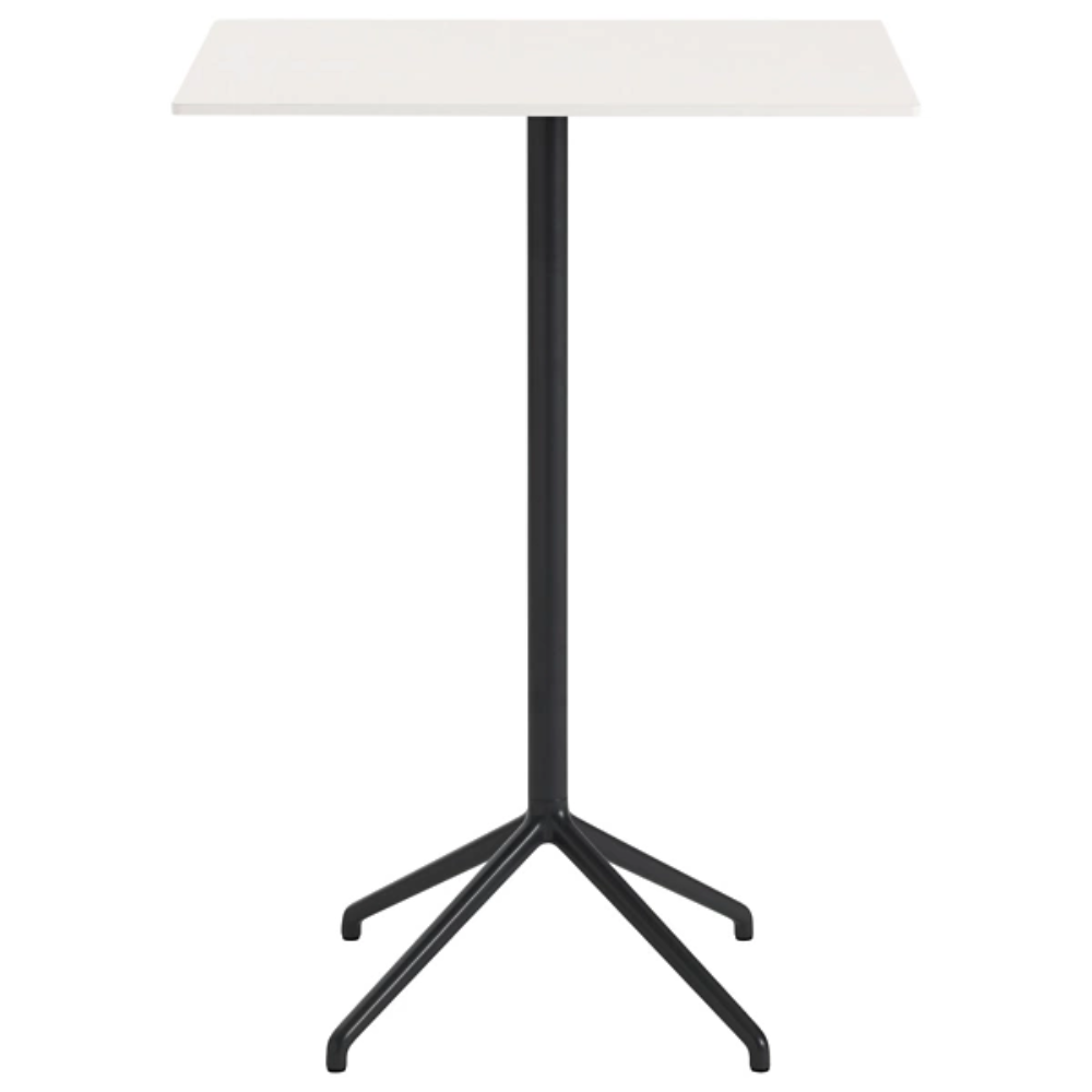 The 41 inch Still Cafe Table from Muuto with the white nanolaminate table top and black frame.