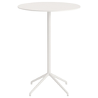 The 41 inch Still Round Cafe Table from Muuto with the white nanolaminate table top and white frame.