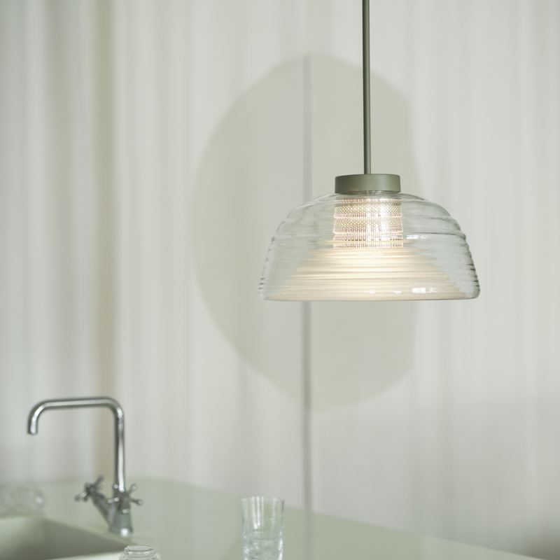 The Two Layer Pendant Lamp Grey from Muuto in a kitchen.