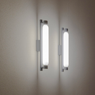 The La Roche Wall Sconce from Nemo in gray in an office.