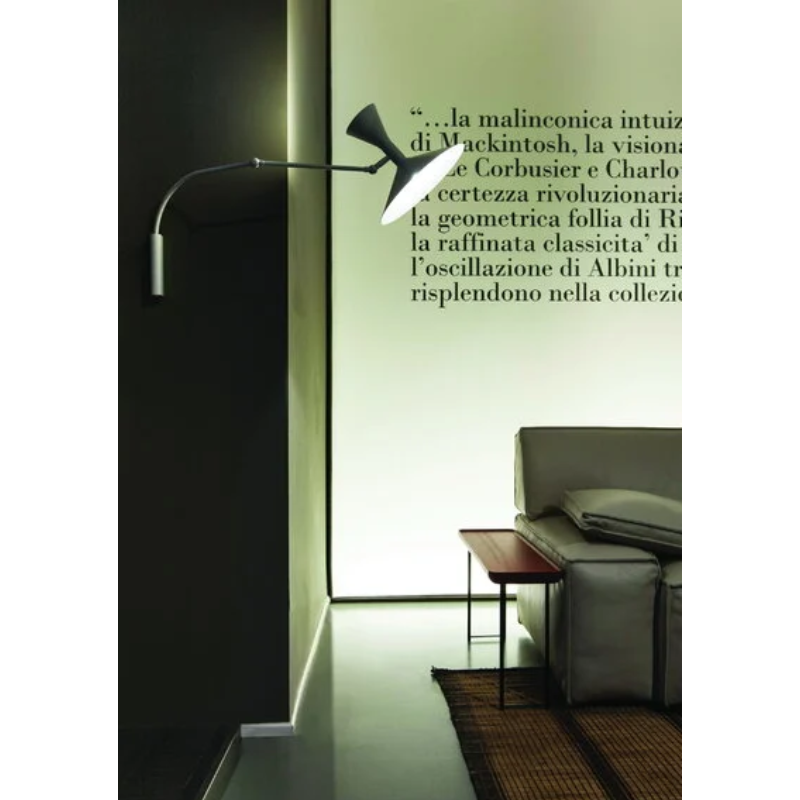 The Lampe de Marseille Mini Wall Sconce from Nemo in black in a family room.