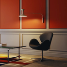 The Lampe de Marseille Mini Wall Sconce from Nemo in whitewash in an office.