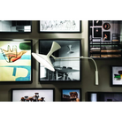 The Lampe de Marseille Mini Wall Sconce from Nemo in whitewash in an art studio.