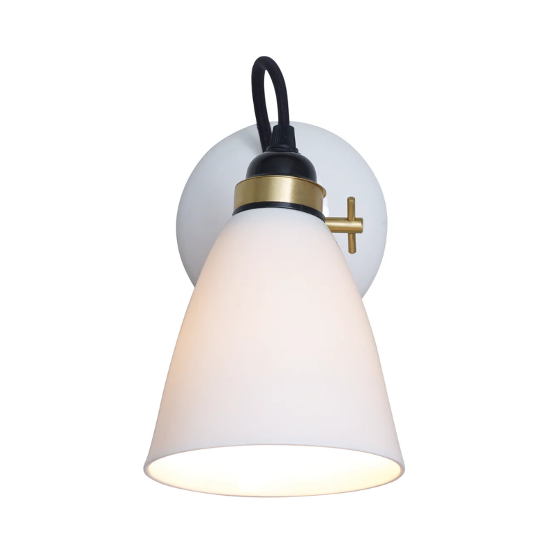 The Original BTC Hector Medium Dome Wall Sconce satin brass with black fabric cord from the front.