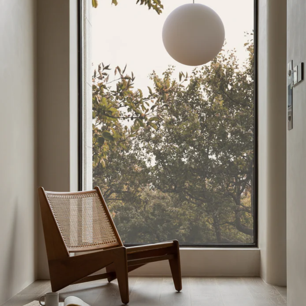 The Bola Sphere from Pablo Designs in a family area. all-groups