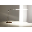 The LIM360 Table Lamp from Pablo Designs in a family area. all-groups
