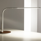 The LIM360 Table Lamp from Pablo Designs in a home office. all-groups
