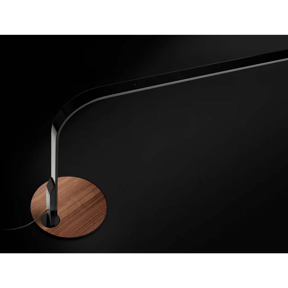 The LIM360 Table Lamp from Pablo Designs in a living room. all-groups