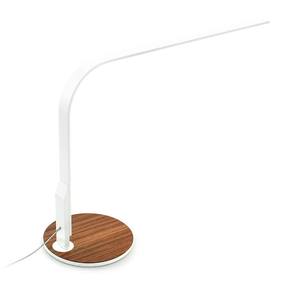 The white and walnut LIM360 Table Lamp from Pablo Designs.