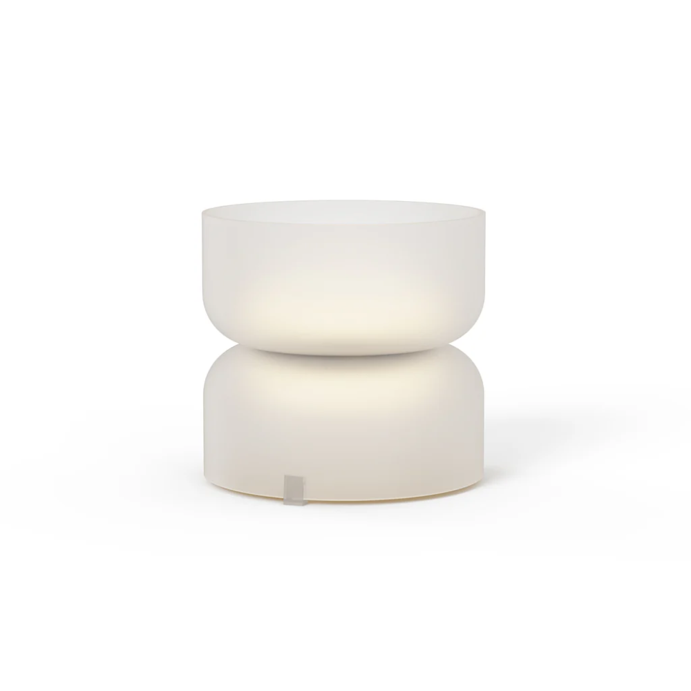 The etched white Mini Totem Table Lamp from Pablo Designs.