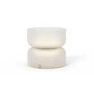 The etched white Mini Totem Table Lamp from Pablo Designs.