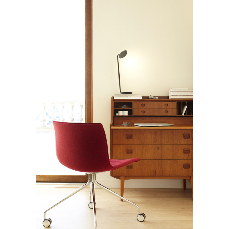 The graphite Pixo Plus from Pablo Designs in a living area.