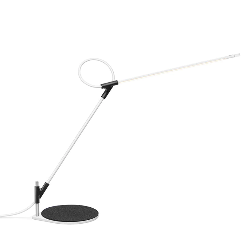 The white Superlight Table Lamp from Pablo Designs with the black base.