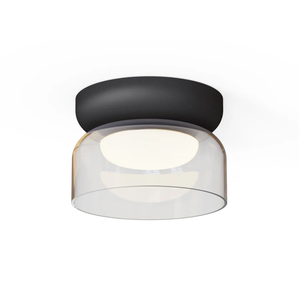 The Totem Mini Flush Mount by Pablo Designs with a clear shade and black base mount.