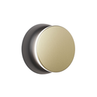 The black and brass Totem Puck Ceiling or Wall Light from Pablo Designs.
