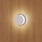 The Totem Puck Ceiling or Wall Light from Pablo Designs in a living room. all-groups