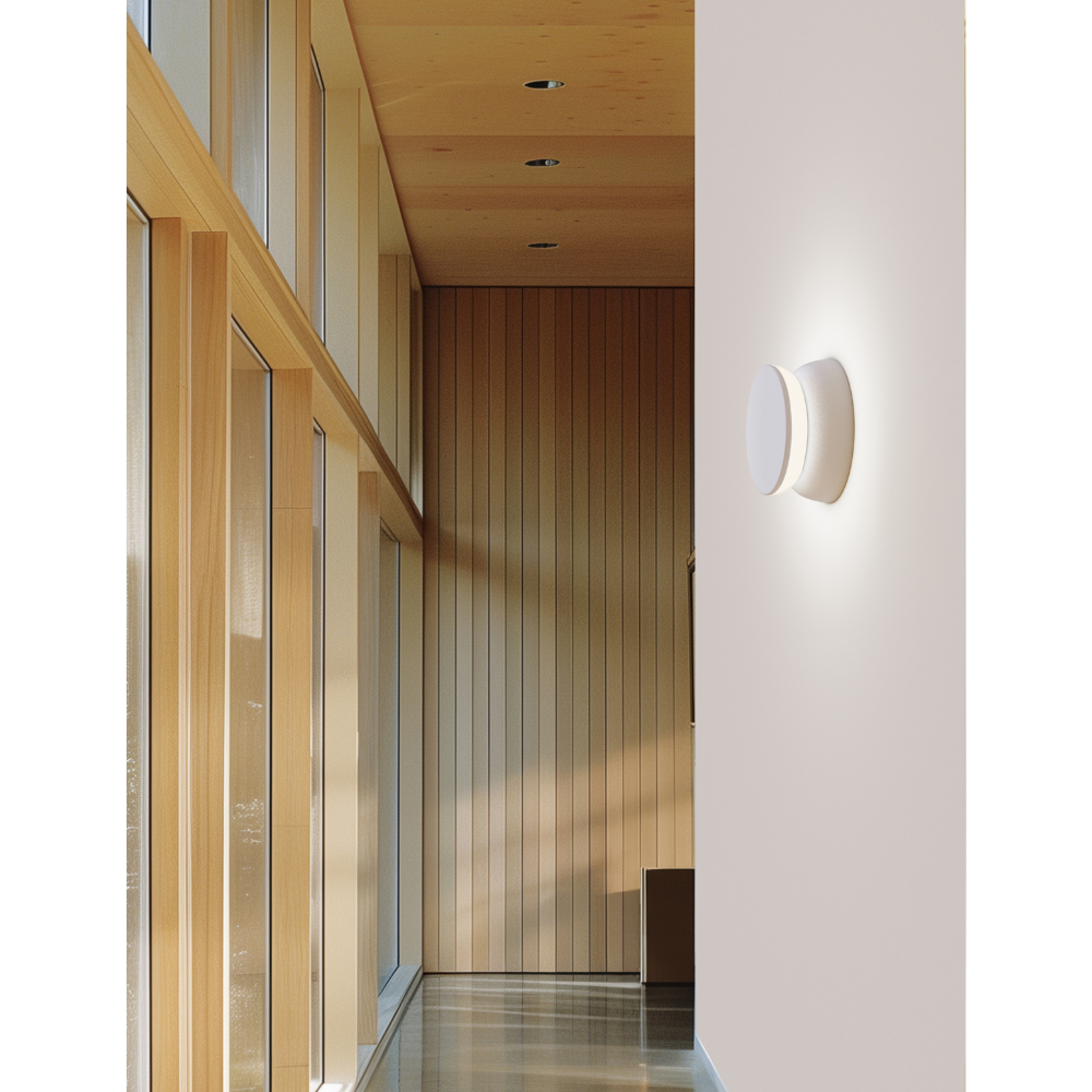 The Totem Puck Ceiling or Wall Light from Pablo Designs in a living space. all-groups