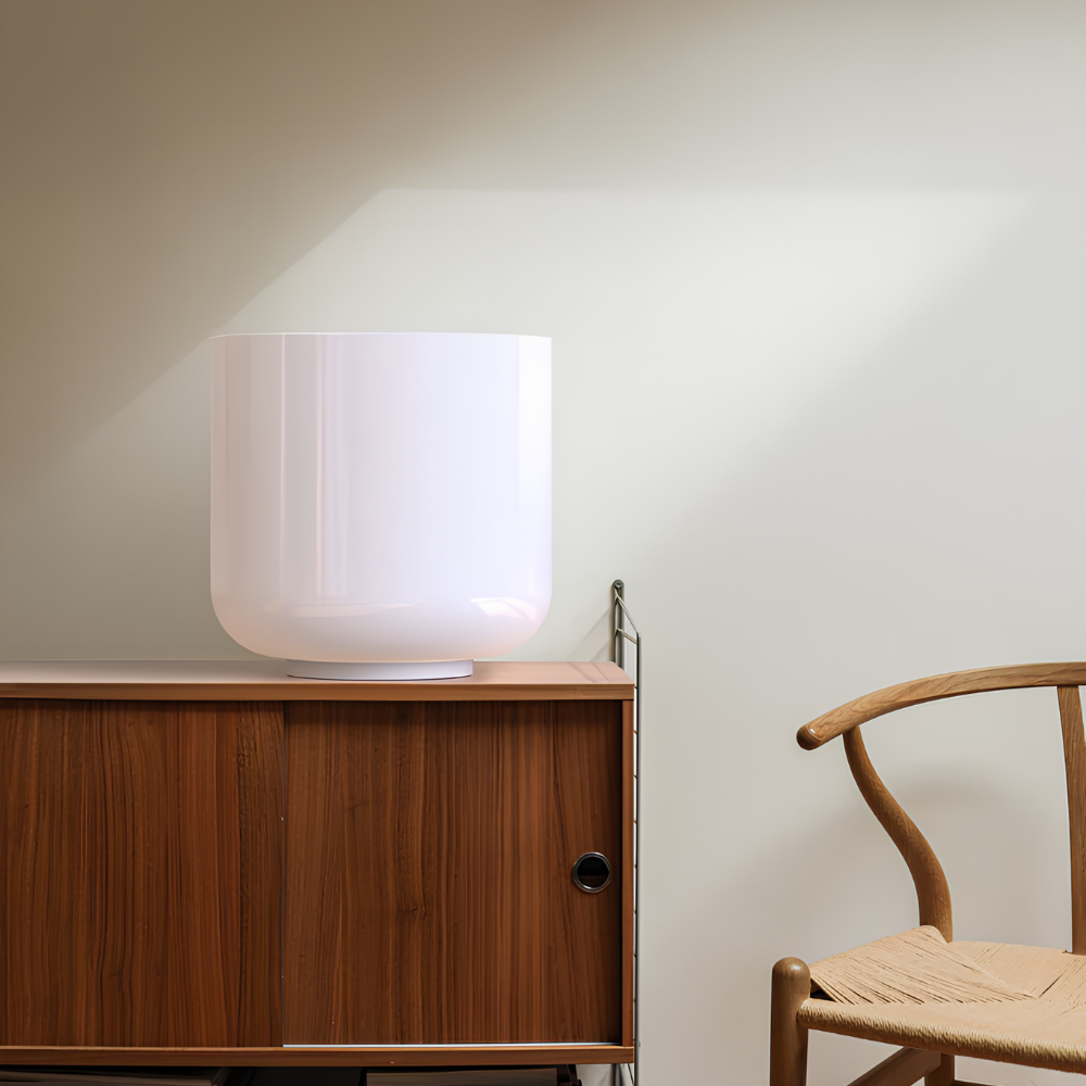 The Totem Single Table Lamp design A from Pablo Designs in a primary bedroom.