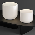 Both the Totem Single Table Lamp design A and B from Pablo Designs in a living space. all-groups