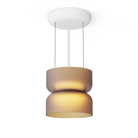 The etched amber and white Totem Up/Down Mini Pendant from Pablo Designs.