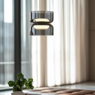 The The Totem Up/Down Mini Pendant from Pablo Designs in a lounge. all-groups