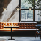 The Totem Up/Down Mini Pendant from Pablo Designs in a restaurant. all-groups