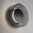 The Totem Sconce by Pablo Designs in Black / Black / Smoke up close on a wall. all-groups