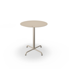 The small beige Pico Round Cafe Table 4-Star Base by Houe.