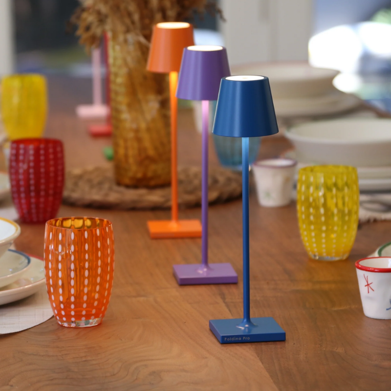 The Poldina Pro Micro from Zafferano on a dining table with the color collection.