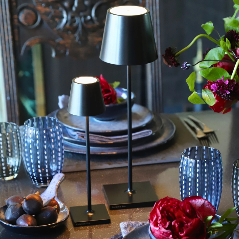 The black Poldina Pro Micro from Zafferano in a dining space.