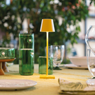 The sunflower Poldina Pro Micro from Zafferano in an outdoor dining set up.