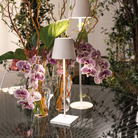 The white Poldina Pro Micro from Zafferano in a dining room.